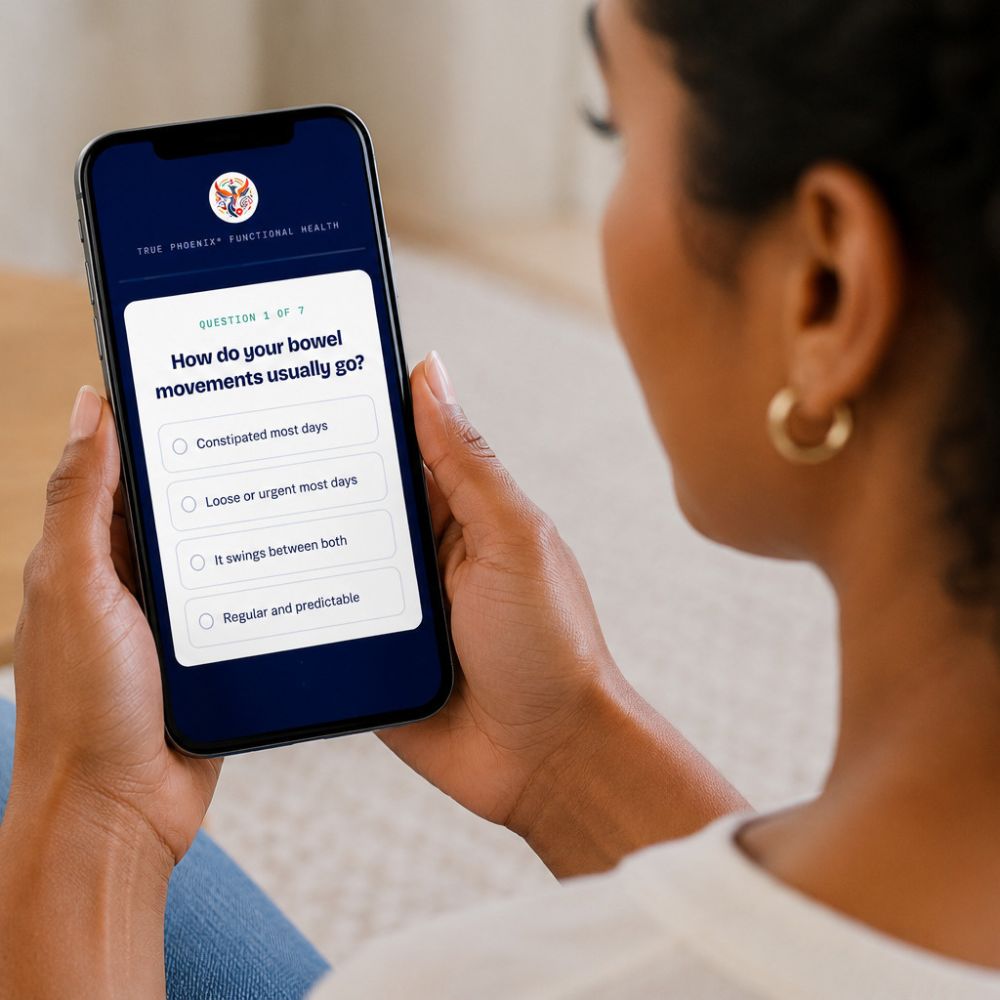 Get_the_Gut_Health_App Woman using the True Phoenix GutCheck app on her smartphone to complete a gut health symptom assessment and receive personalized digestive wellness insights.